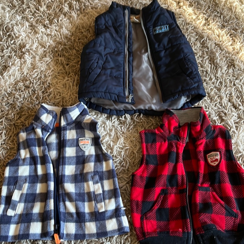 Baby boys winter vests. 6-12 months.  All vests included in price